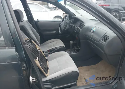 1997 Toyota Corolla Std z USA, uszkodzony, nr VIN 1NXBA02E1VZ619295